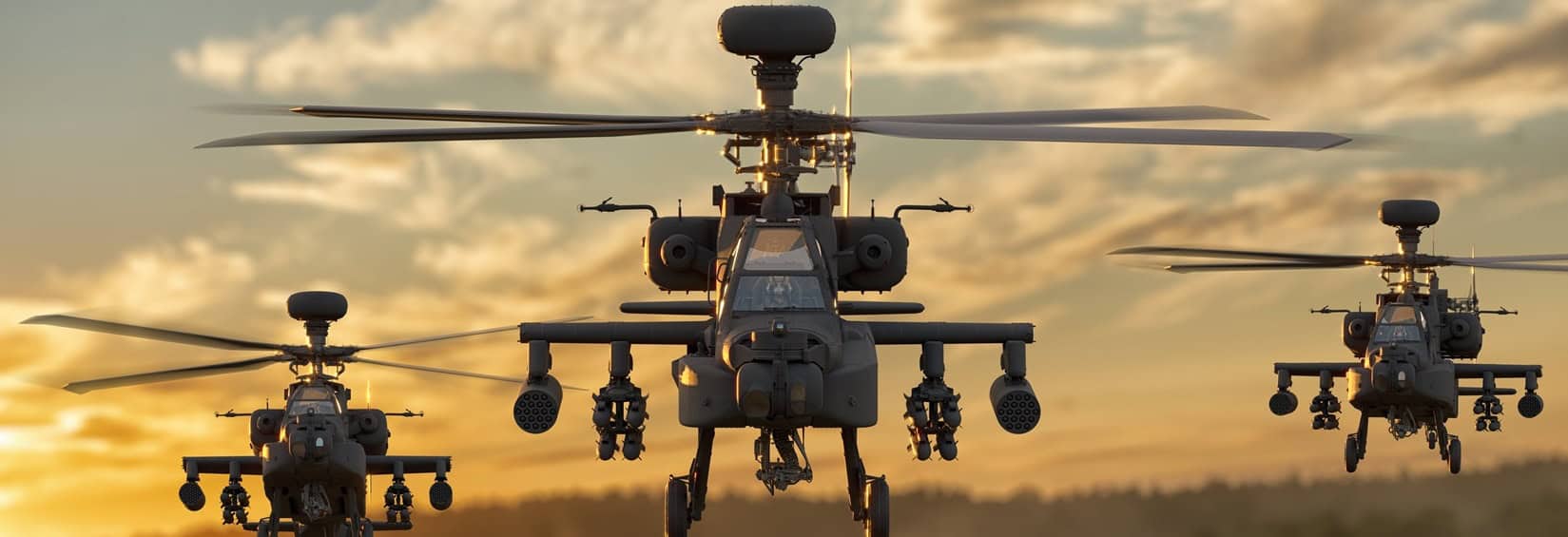 Three military helicopters fly in formation against a sunset sky.